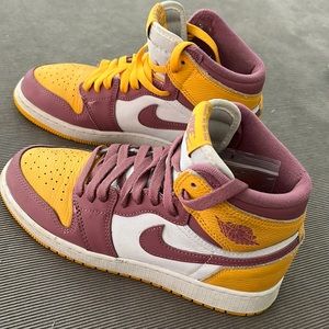 Size 5 purple, white, gold, Nike swoosh high tops. Worn two times, like new!